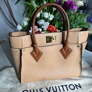 Used 2 . Very classy timeless LV bag. Practically brand new